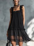 Vestito mini nero a pois trasparente con bordo in pizzo e volant